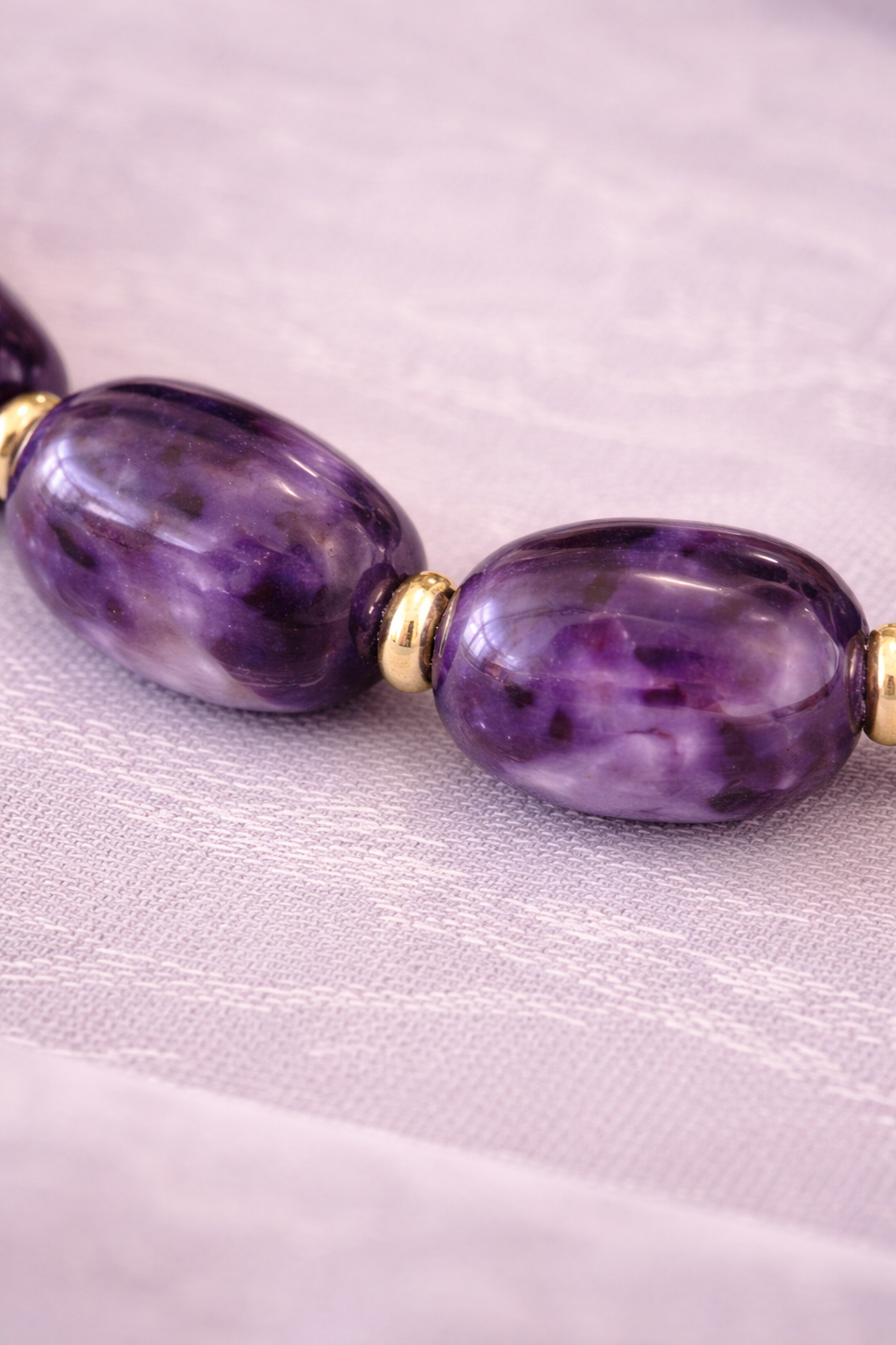 Bracelet en améthyste naturelle – perles ovales – pierre de sérénité et protection