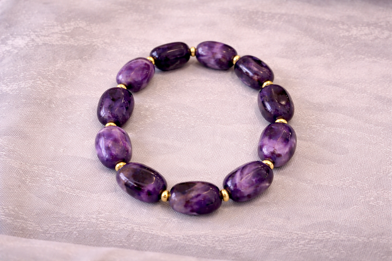 Bracelet en améthyste naturelle – perles ovales – pierre de sérénité et protection